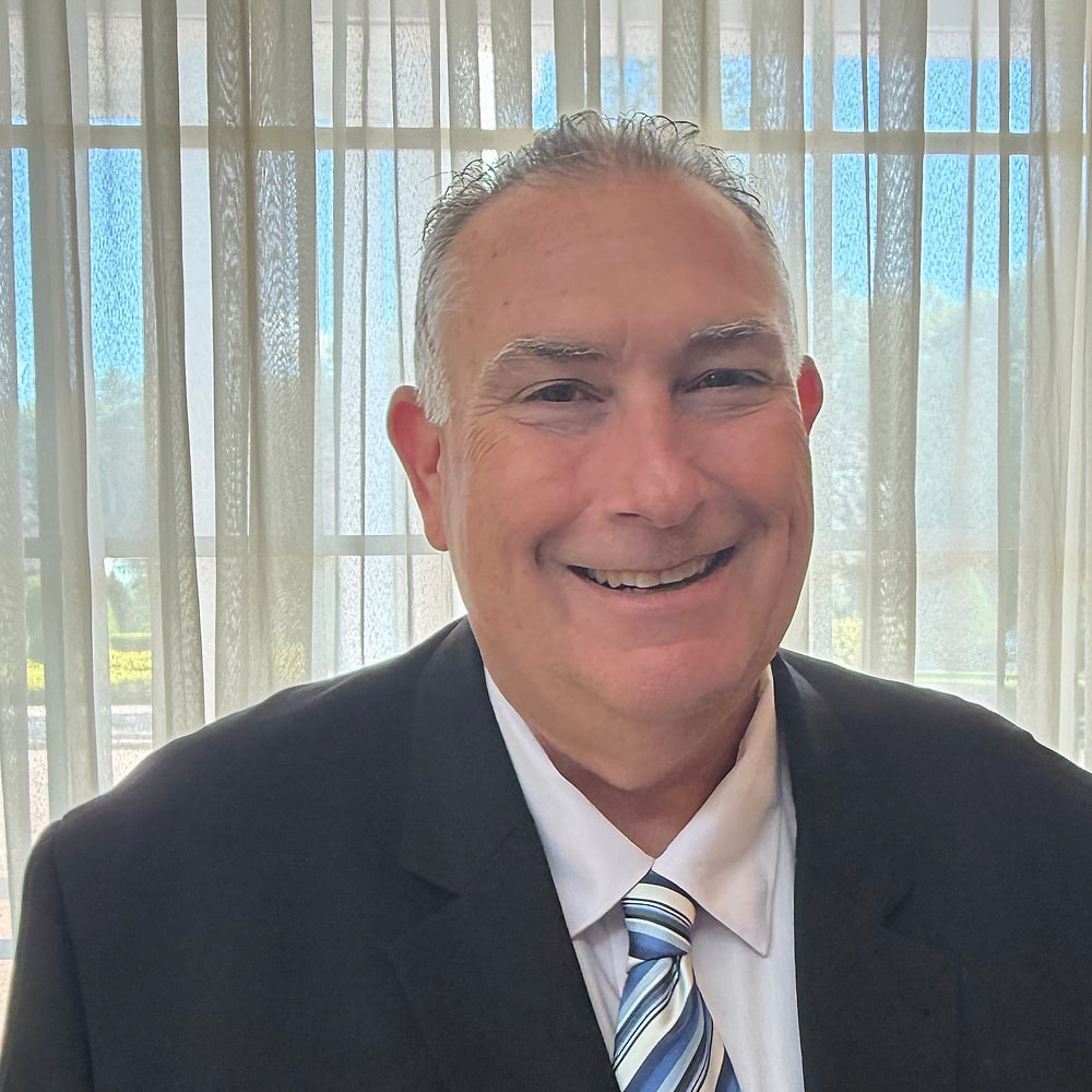 John W. Halloran, CPA, Managing Partner